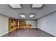 Finished basement space with wood laminate floors and built-in cabinetry at 2701 Stilesboro Nw Ln, Acworth, GA 30101