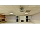 Finished basement with projector, screen, and built-in shelving for media equipment at 2701 Stilesboro Nw Ln, Acworth, GA 30101