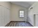 Bedroom with plush gray carpet, closet, and ample natural light at 2701 Stilesboro Nw Ln, Acworth, GA 30101