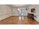 Formal dining room with hardwood floors, chandelier, and large windows at 2701 Stilesboro Nw Ln, Acworth, GA 30101