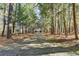 Long driveway lined with trees leading to a residential property at 2701 Stilesboro Nw Ln, Acworth, GA 30101