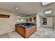 Basement hot tub room with tile flooring and mirrored walls at 2701 Stilesboro Nw Ln, Acworth, GA 30101