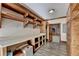 Laundry room with ample counter space, shelving, and tile flooring at 2701 Stilesboro Nw Ln, Acworth, GA 30101