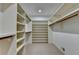 A walk-in closet offers a multitude of storage spaces for personal belongings at 2701 Stilesboro Nw Ln, Acworth, GA 30101