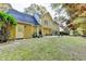 House exterior showcasing a large backyard at 3034 Brookgreen Trl, Lawrenceville, GA 30043
