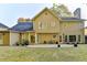 Back exterior view showing a two story home with patio at 3034 Brookgreen Trl, Lawrenceville, GA 30043