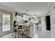 Kitchen with white cabinets, granite countertops, and an island at 3034 Brookgreen Trl, Lawrenceville, GA 30043