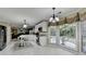Open concept kitchen with island, stainless steel appliances, and Gathering room view at 3034 Brookgreen Trl, Lawrenceville, GA 30043