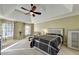 Main bedroom with high ceilings, large windows, and plush carpet at 3034 Brookgreen Trl, Lawrenceville, GA 30043