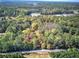 Aerial view of wooded lot near road at 810 Mcconnell Rd, Powder Springs, GA 30127