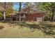 Brick Ranch home with screened porch and large yard at 810 Mcconnell Rd, Powder Springs, GA 30127