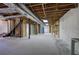 Unfinished basement area with high ceilings and storage at 810 Mcconnell Rd, Powder Springs, GA 30127