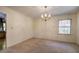 Dining room with chandelier and access to kitchen at 810 Mcconnell Rd, Powder Springs, GA 30127