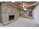 Spacious finished basement with brick fireplace and ample storage at 810 Mcconnell Rd, Powder Springs, GA 30127