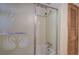 Bathroom with shower/tub and patterned glass shower door at 810 Mcconnell Rd, Powder Springs, GA 30127