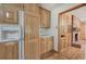 Kitchen area with wood cabinets, built-in pantry, and hardwood floors at 810 Mcconnell Rd, Powder Springs, GA 30127