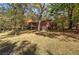 Brick Ranch home with screened porch and large yard at 810 Mcconnell Rd, Powder Springs, GA 30127