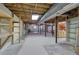 Large unfinished basement with shelving and workbench area at 810 Mcconnell Rd, Powder Springs, GA 30127