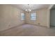 Spacious dining room with large windows and chandelier at 810 Mcconnell Rd, Powder Springs, GA 30127