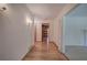 Hardwood floor hallway with access to multiple rooms at 810 Mcconnell Rd, Powder Springs, GA 30127