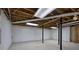 Unfinished basement area with high ceilings and concrete floor at 810 Mcconnell Rd, Powder Springs, GA 30127