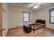 Simple bedroom with hardwood floors and a window at 810 Mcconnell Rd, Powder Springs, GA 30127