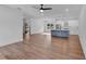 Open concept kitchen with island, stainless steel appliances, and white shaker cabinets at 38 Puckett Se Rd, Emerson, GA 30137