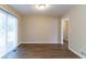 Dining area with hardwood floors and sliding glass doors at 929 Pine Roc Dr, Stone Mountain, GA 30083