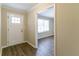 Bright entryway with hardwood floors and view to living room at 929 Pine Roc Dr, Stone Mountain, GA 30083