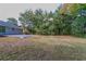 Private backyard with wooded backdrop at 929 Pine Roc Dr, Stone Mountain, GA 30083