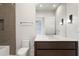 Modern bathroom with a double vanity and gray tile at 1301 Peachtree St # 4L, Atlanta, GA 30309