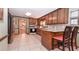 Kitchen with island, granite countertops, and stainless steel appliances at 801 Hampton Sw Pl, Marietta, GA 30064