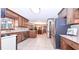 Spacious kitchen featuring granite countertops, stainless steel appliances, and ample wood cabinetry at 801 Hampton Sw Pl, Marietta, GA 30064