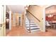 Bright entryway with hardwood floors and staircase at 801 Hampton Sw Pl, Marietta, GA 30064