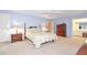 Spacious bedroom with carpeted floor, a dresser, and a queen-size bed at 801 Hampton Sw Pl, Marietta, GA 30064