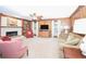 Living room with fireplace, built-ins, and large windows at 801 Hampton Sw Pl, Marietta, GA 30064