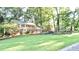 Brick home with landscaped yard and stone accents at 801 Hampton Sw Pl, Marietta, GA 30064