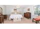 Charming bedroom with antique furniture and natural light at 801 Hampton Sw Pl, Marietta, GA 30064