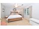 Bedroom with a double bed, ceiling fan, and neutral color palette at 801 Hampton Sw Pl, Marietta, GA 30064