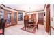 Bright dining room with French doors leading to a deck at 801 Hampton Sw Pl, Marietta, GA 30064