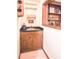 Convenient wet bar with sink, shelving, and wine storage at 801 Hampton Sw Pl, Marietta, GA 30064