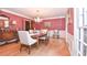 Formal dining room with hardwood floors and chandelier at 801 Hampton Sw Pl, Marietta, GA 30064