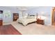Bright bedroom featuring a queen bed, built-in shelving, and ample natural light at 801 Hampton Sw Pl, Marietta, GA 30064