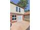 Updated back exterior, featuring double doors and brick at 3158 Olive Tree Ct, Decatur, GA 30034