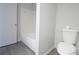 Clean bathroom with a shower/tub combo and gray vinyl flooring at 3158 Olive Tree Ct, Decatur, GA 30034