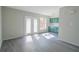 Bright living room featuring gray flooring and French doors at 3158 Olive Tree Ct, Decatur, GA 30034