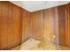 Unfinished basement with wood paneling and tile floor at 2243 Tiger Flowers Nw Dr, Atlanta, GA 30314