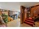 Unfinished basement with storage, stairs, and seating area at 2243 Tiger Flowers Nw Dr, Atlanta, GA 30314