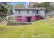 House with a spacious backyard and large grassy area at 2243 Tiger Flowers Nw Dr, Atlanta, GA 30314