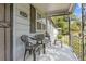 Front porch with black metal railing and seating at 2243 Tiger Flowers Nw Dr, Atlanta, GA 30314